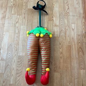 Elf legs to hang out of Christmas tree and look like an elf is stuck. Smoke free